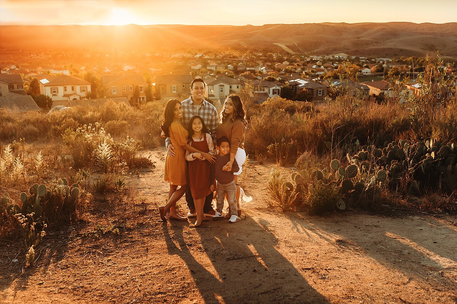  Family in golden hour light by Carlsbad lifestyle session Christa Paustenbaugh 