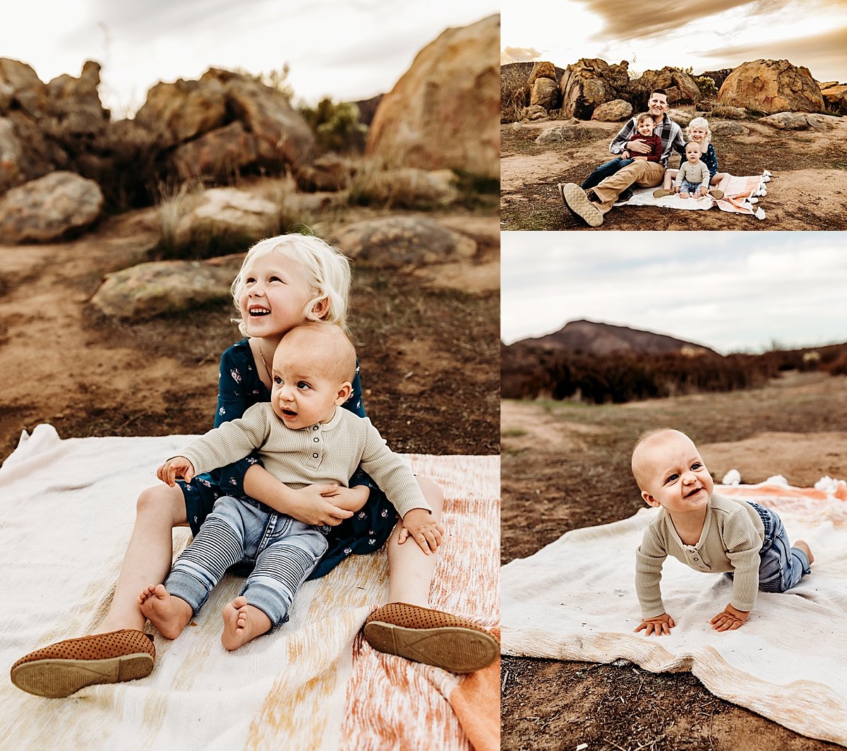  kids sitting on blanket wearing jeans and a dress for by Christa paustenbaugh photography 